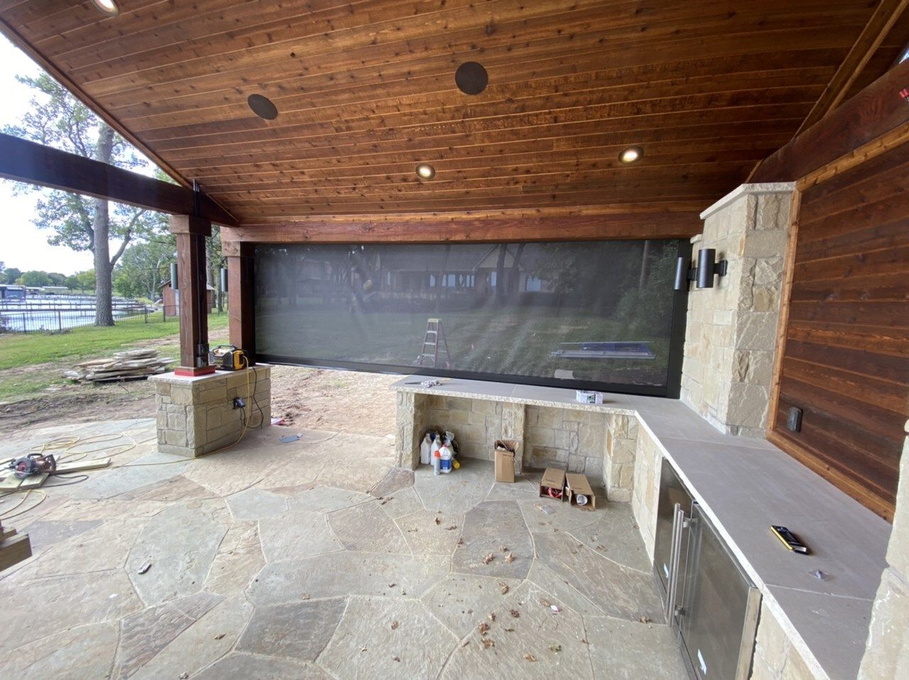 Kitchen run and flagstone floor in progress under the cedar ceiling
